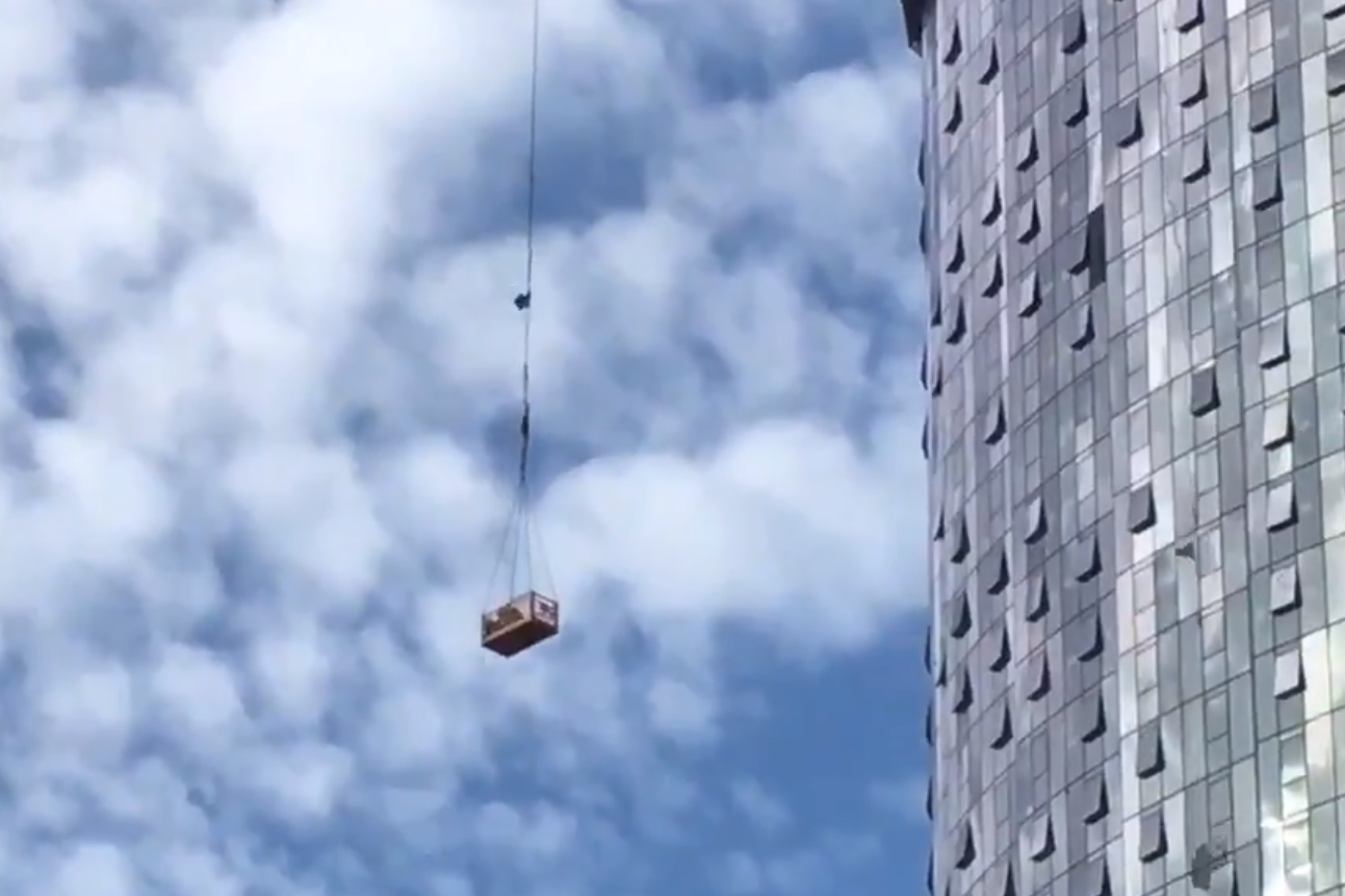 Article image for VIDEO: Injured construction worker safely rescued from 50 storey crane