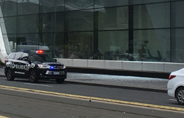 Article image for Glass falls from Crown Casino, shattering on Spencer Street footpath