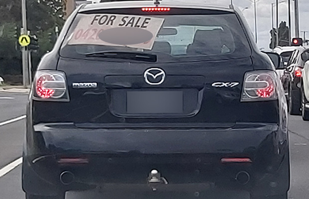Article image for Debate breaks out over ‘For Sale’ sign on car’s back window