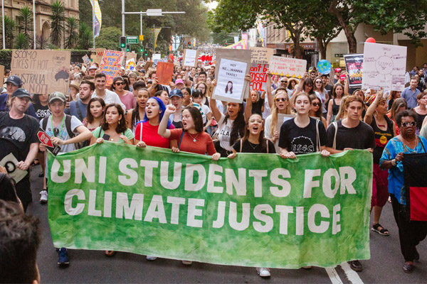 Article image for Climate protester says signs calling for ScoMo house to burn ‘totally appropriate’