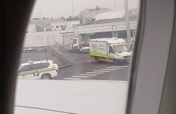 Article image for Passengers stuck on flight from Melbourne as ‘special operations’ ambulances deal with sick passengers