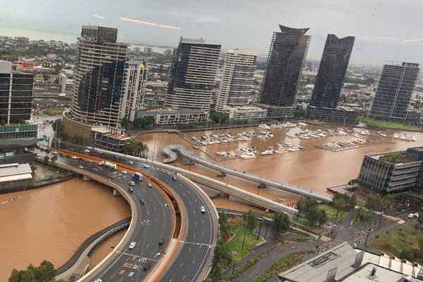 Article image for Brown Melbourne: Dirty downpour forces closure of public pools and Burnley train station