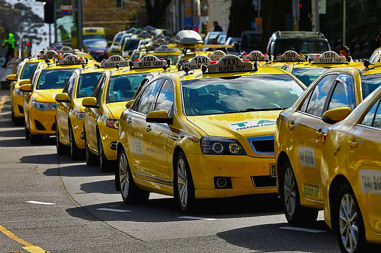 Article image for Vandal slashes tyres on 27 taxis in destructive rampage at Melbourne depot