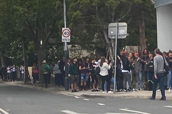 Article image for Hundreds queue outside Centrelink offices as coronavirus unemployment surges