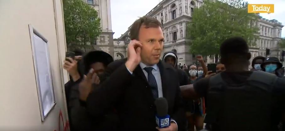 Article image for WATCH: Nine reporter ambushed live on-air covering London protest