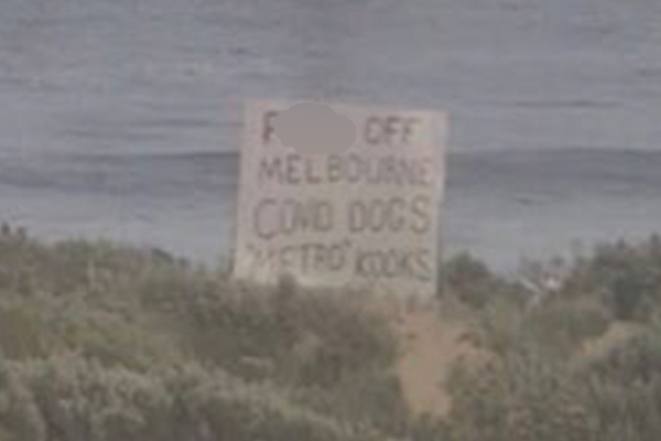 Article image for Angry locals erect sign at popular surf beach