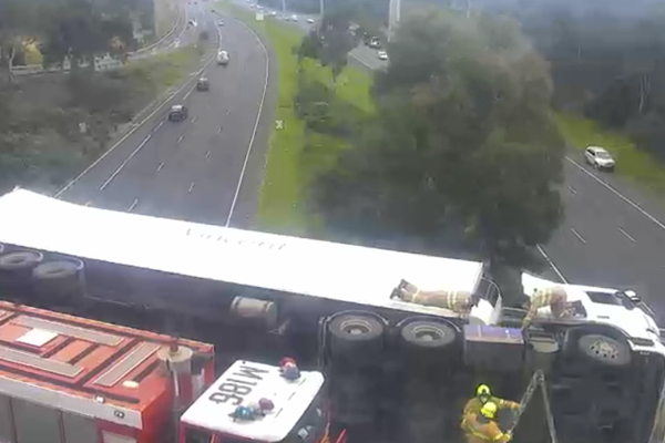 Article image for Nasty truck rollover on Eastern Freeway