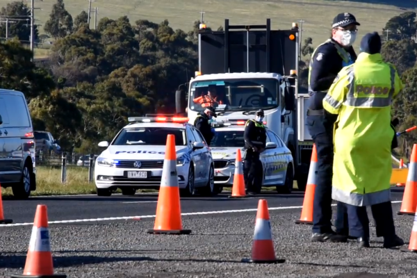 Article image for Children receive a lovely surprise at vehicle checkpoints on the city fringe