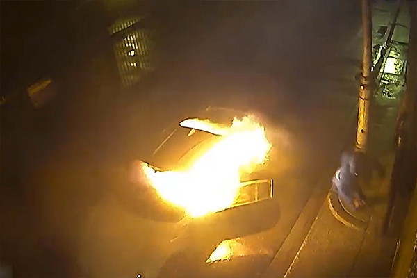 Article image for VIDEO: Idiot sets fire to stolen car while he’s partially inside