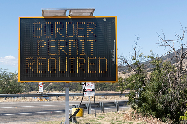 Article image for NSW woman arrested after allegedly fleeing Victorian police at COVID-19 checkpoint