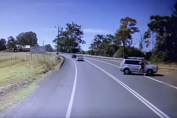 Article image for Tragedy avoided as driver reverses across Princes Highway into oncoming truck