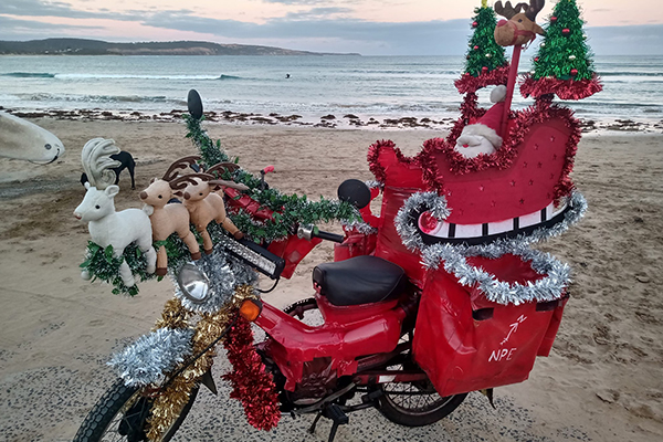 Article image for Why a festive Anglesea mailman has been dobbed in to police