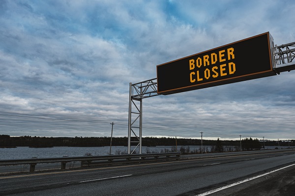 Article image for State border closures tipped to continue for many months