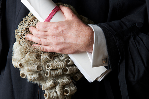 Article image for Almost 100 barristers pen open letter over call to get out of shorts and thongs