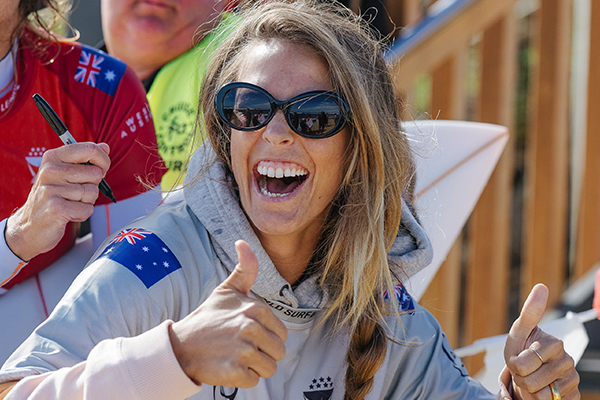 Article image for Olympic snowboarder sparks debate with headstand breastfeeding photo