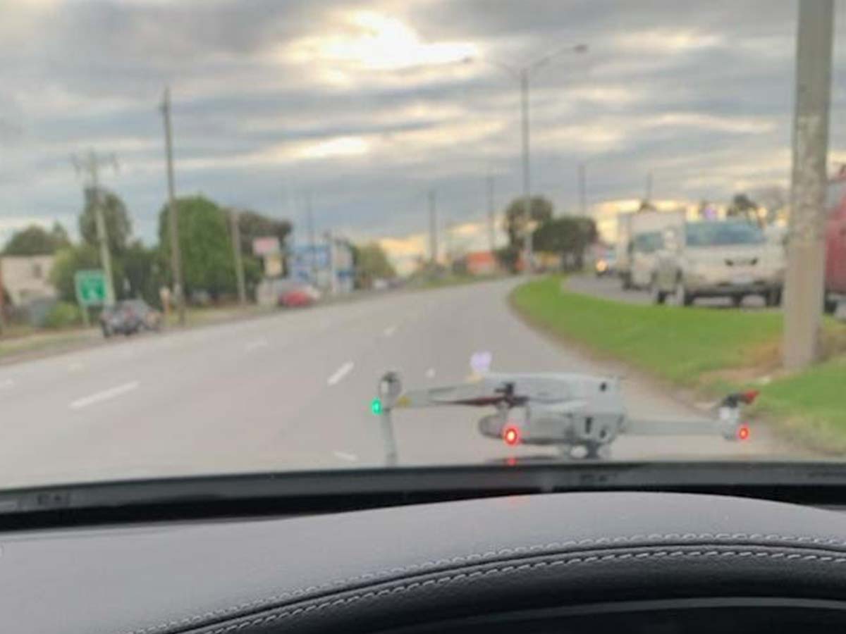 Article image for Motorist gets the shock of his life when drone lands on moving vehicle