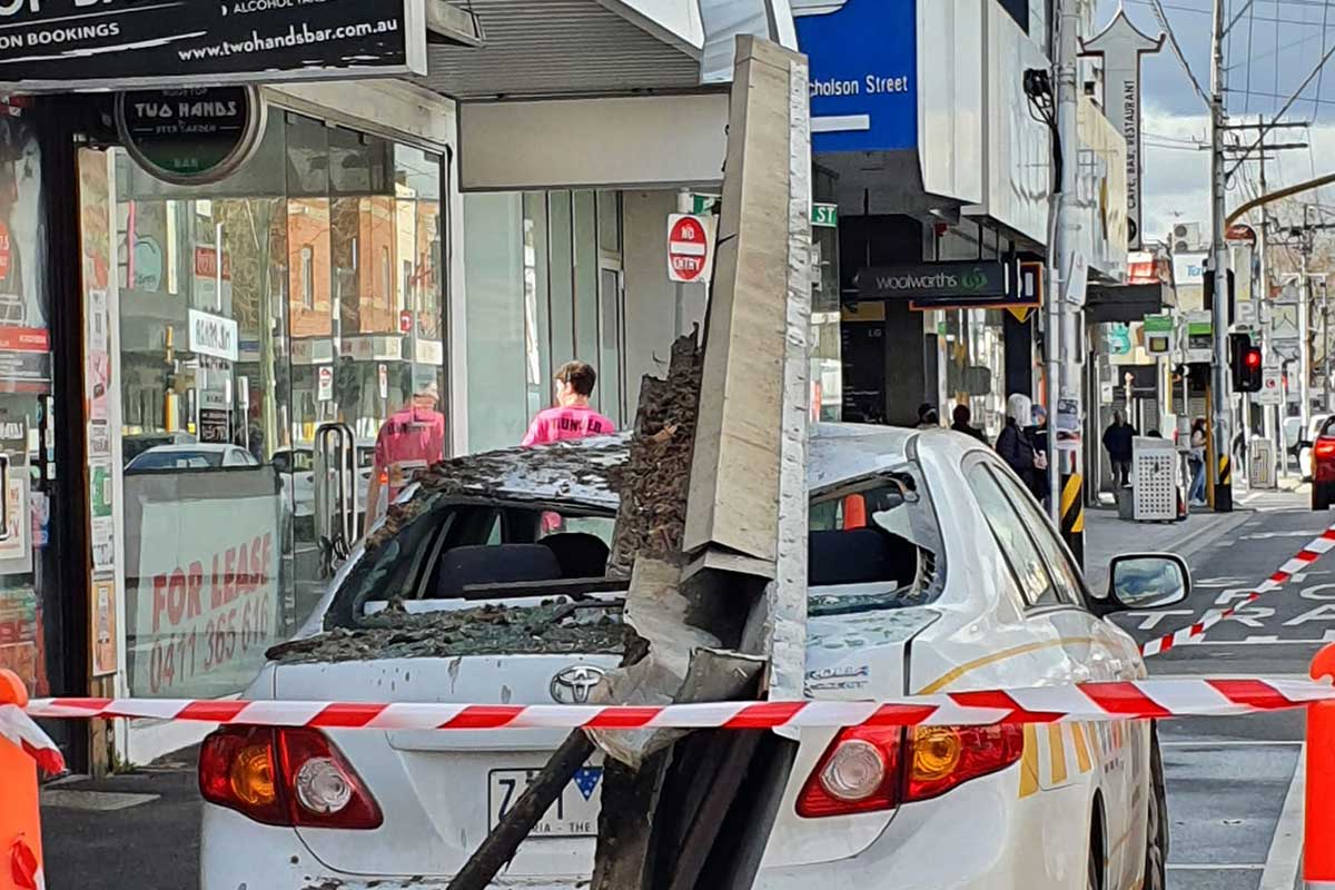 Article image for Parking inspector’s car crushed by falling shopfront