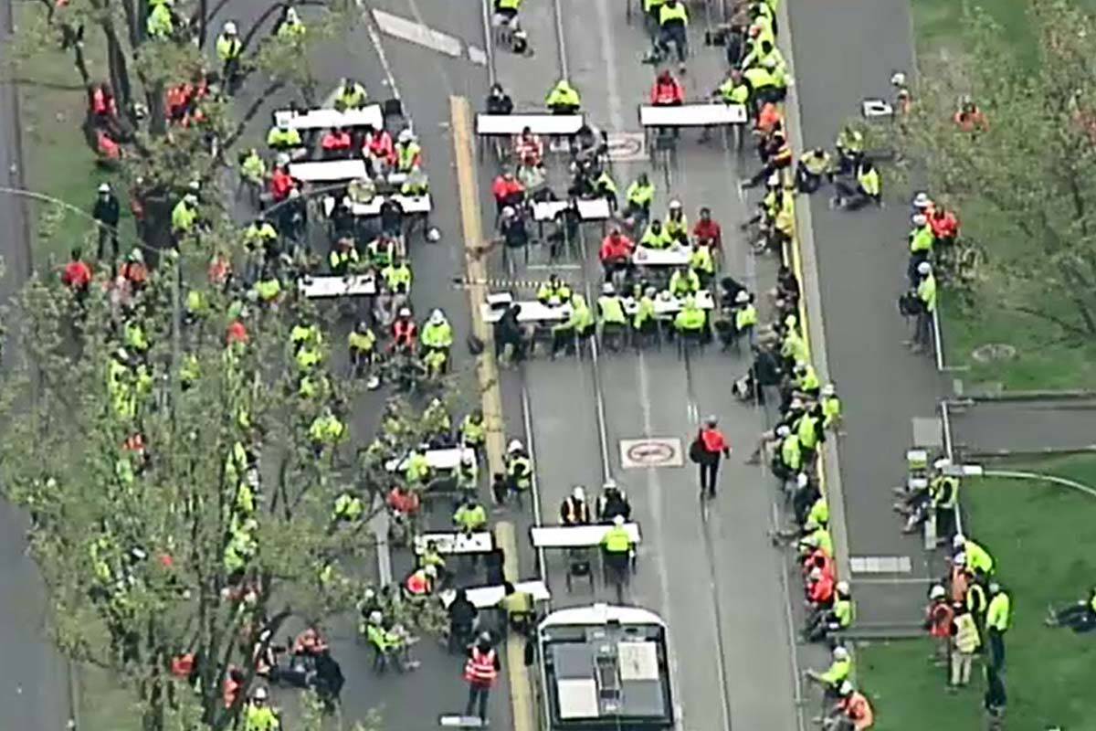 Article image for Union boss says workers blocking roads with tables and chairs are ‘on smoko’