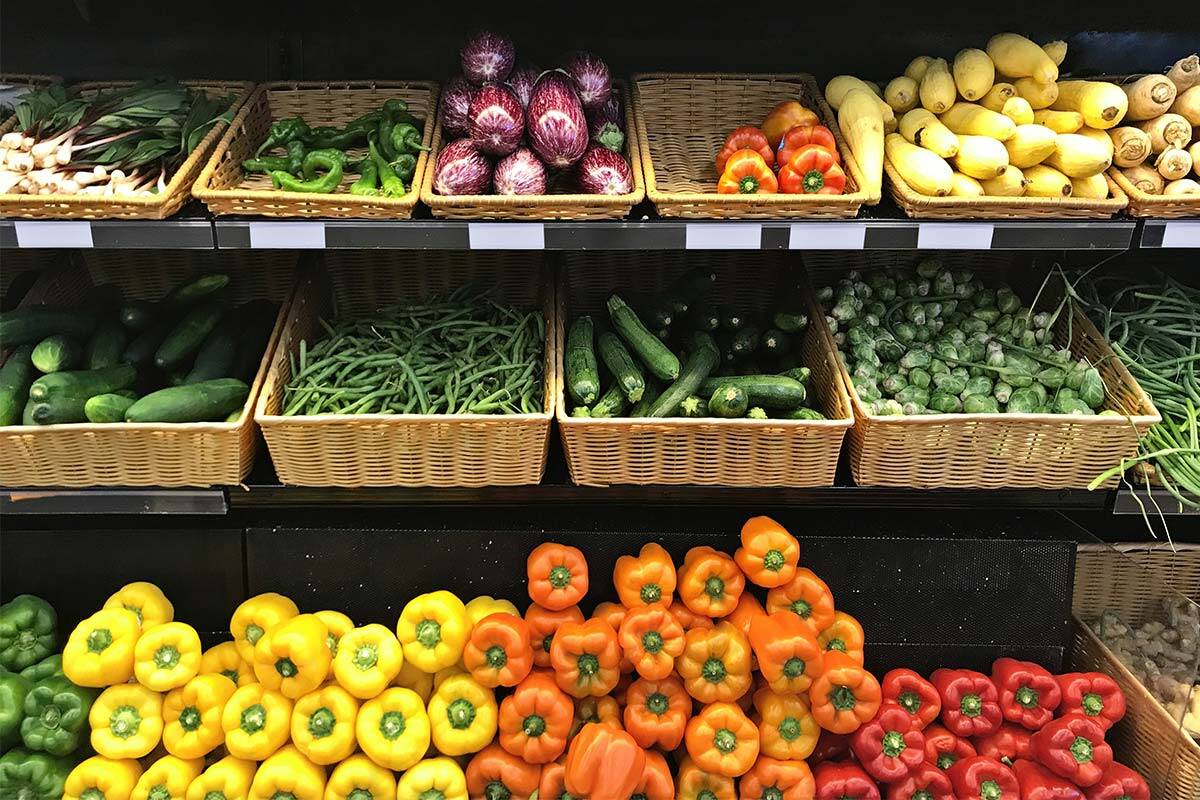 Vegetables on shelves at supermarket