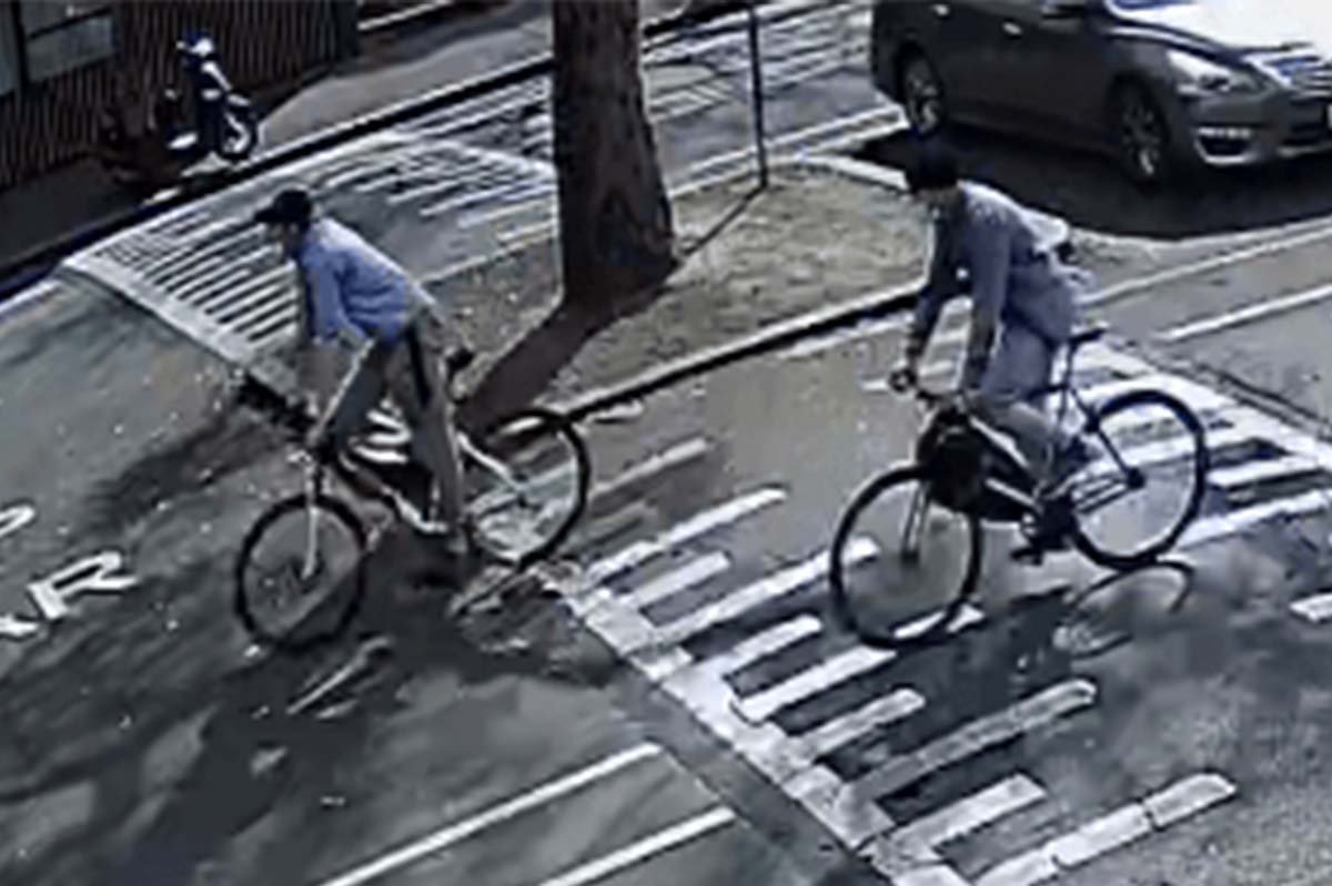 Two men on bikes in West Melbourne