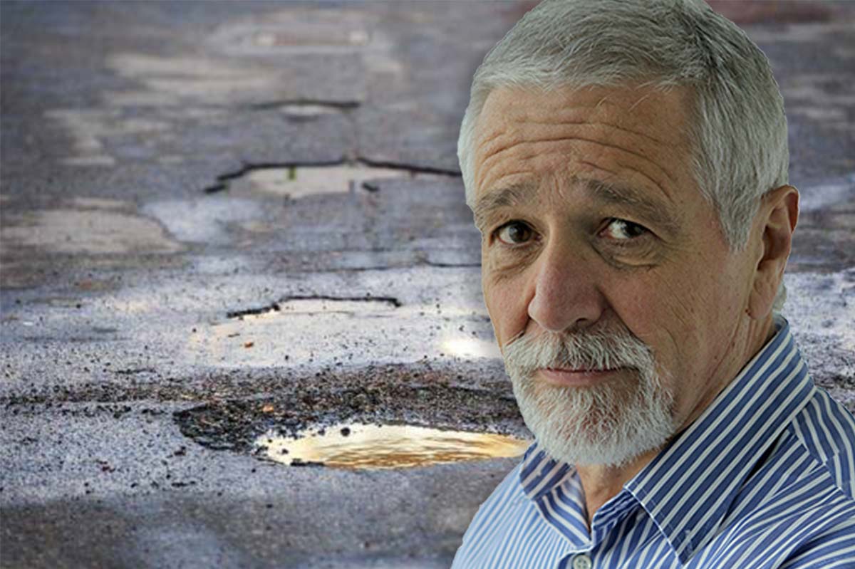 Article image for ‘Bang!’: Neil Mitchell falls victim to Victoria’s serious pothole problem
