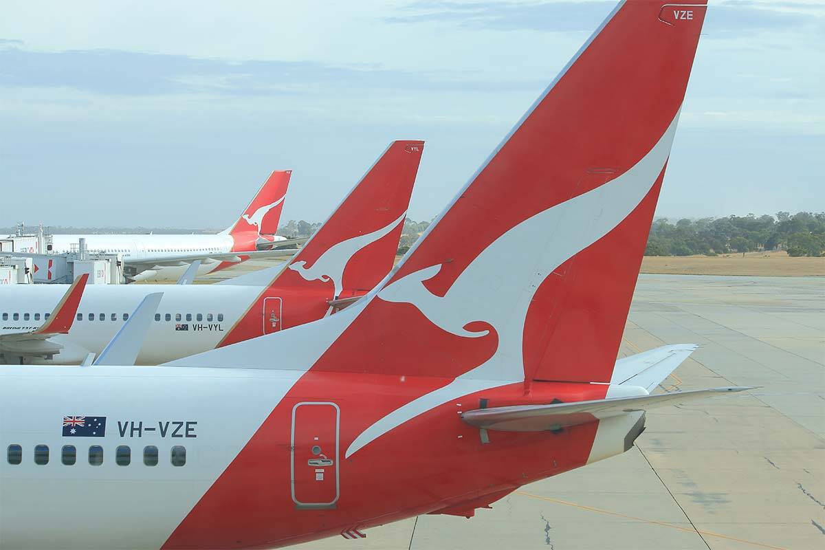Three Qantas planes on tarmac