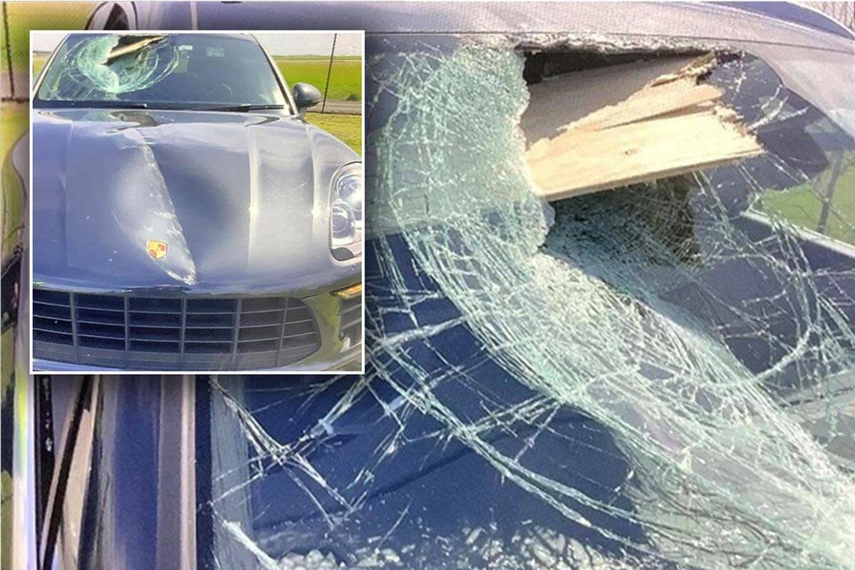 Article image for Driver narrowly avoids serious injury after plank smashes through front of Porsche