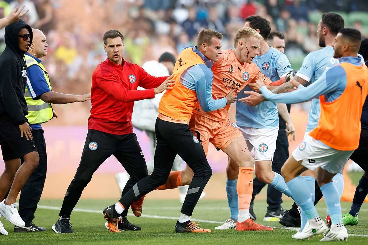 Article image for Goalkeeper and referee attacked by fans in dark day for Australian soccer