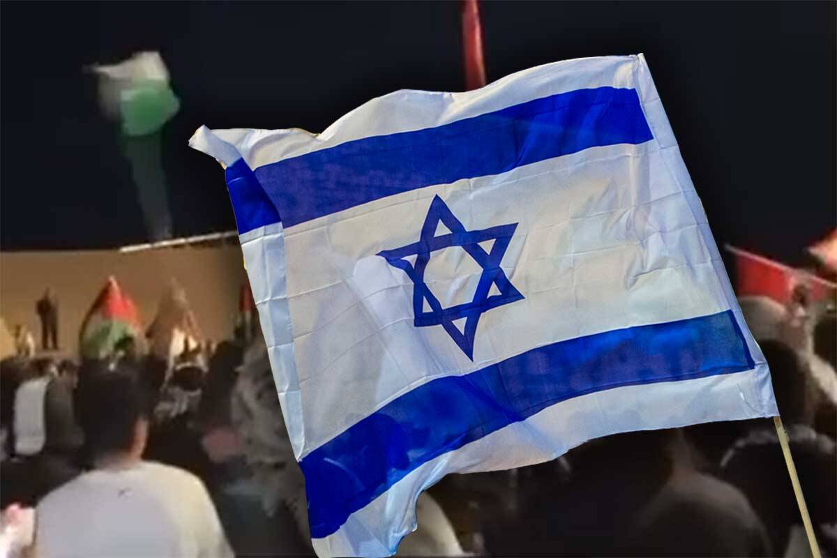 Article image for Anglican pastor chased by mob after waving Israeli flag outside church