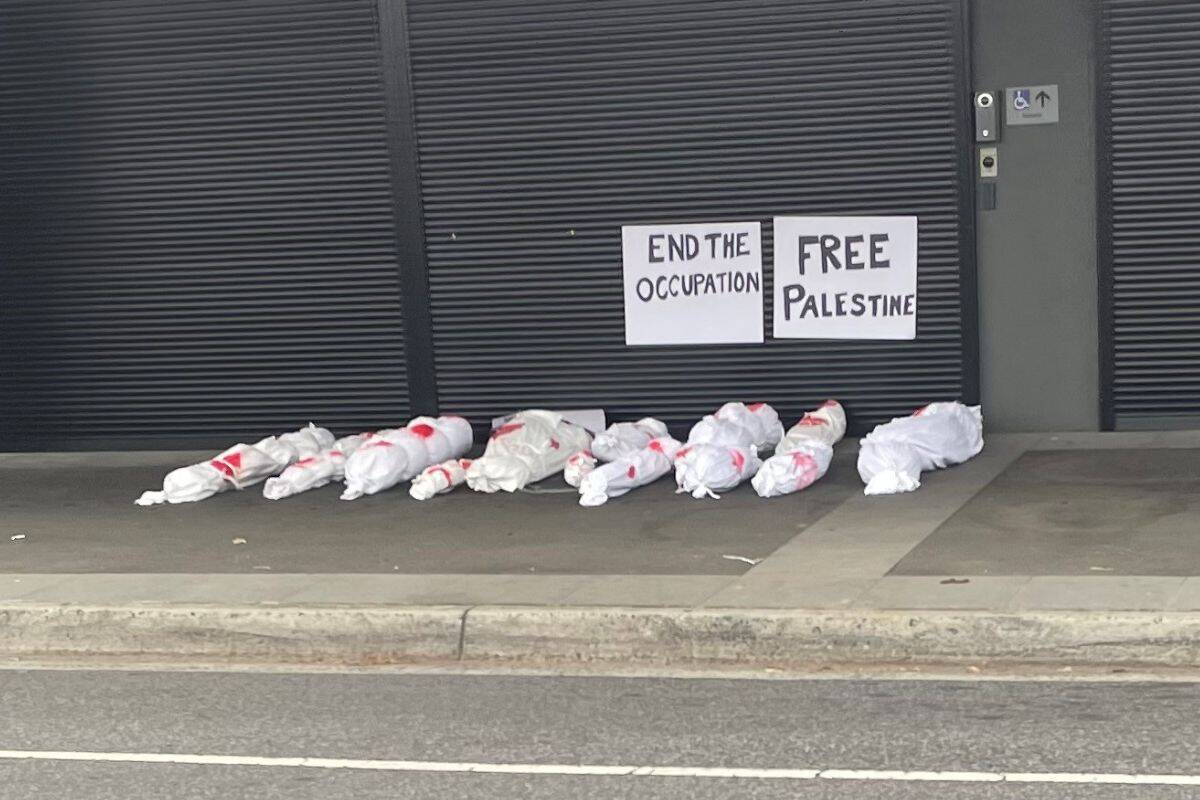Article image for ‘Horrifying and confronting’: Fake bloodied corpses placed outside several MP’s offices