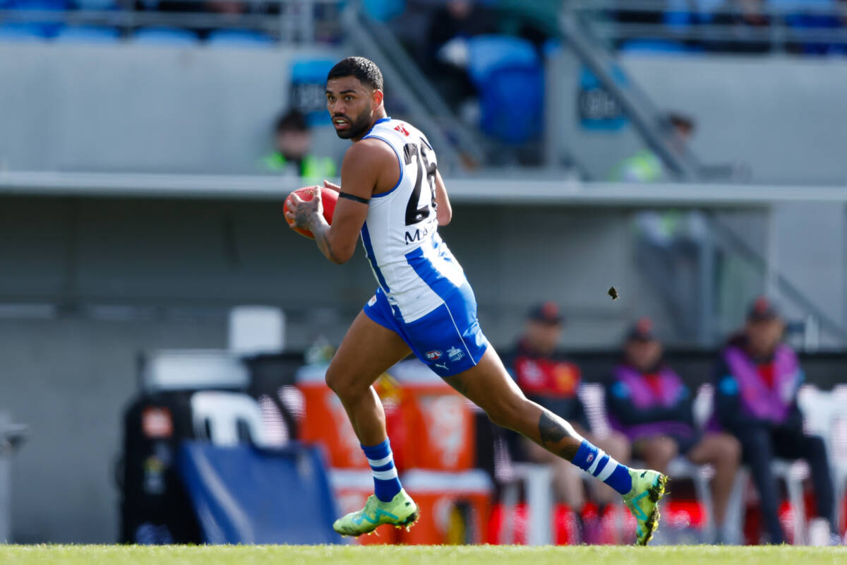 Article image for Former AFL player Tarryn Thomas allegedly held at gunpoint by two men