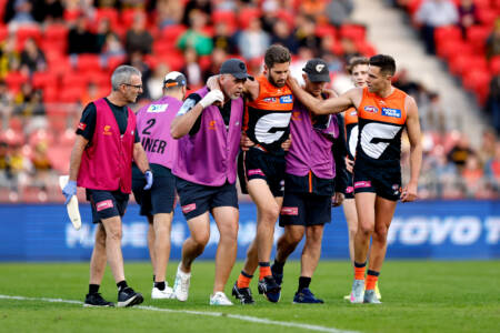 Devastation for Callan Ward as GWS veteran helped from ground