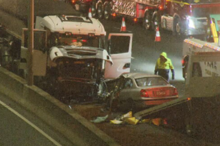 Car driving on wrong side of road collides into truck near Domain Tunnel