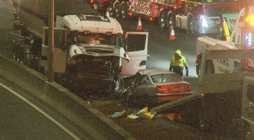 Article image for Car driving on wrong side of road collides into truck near Domain Tunnel