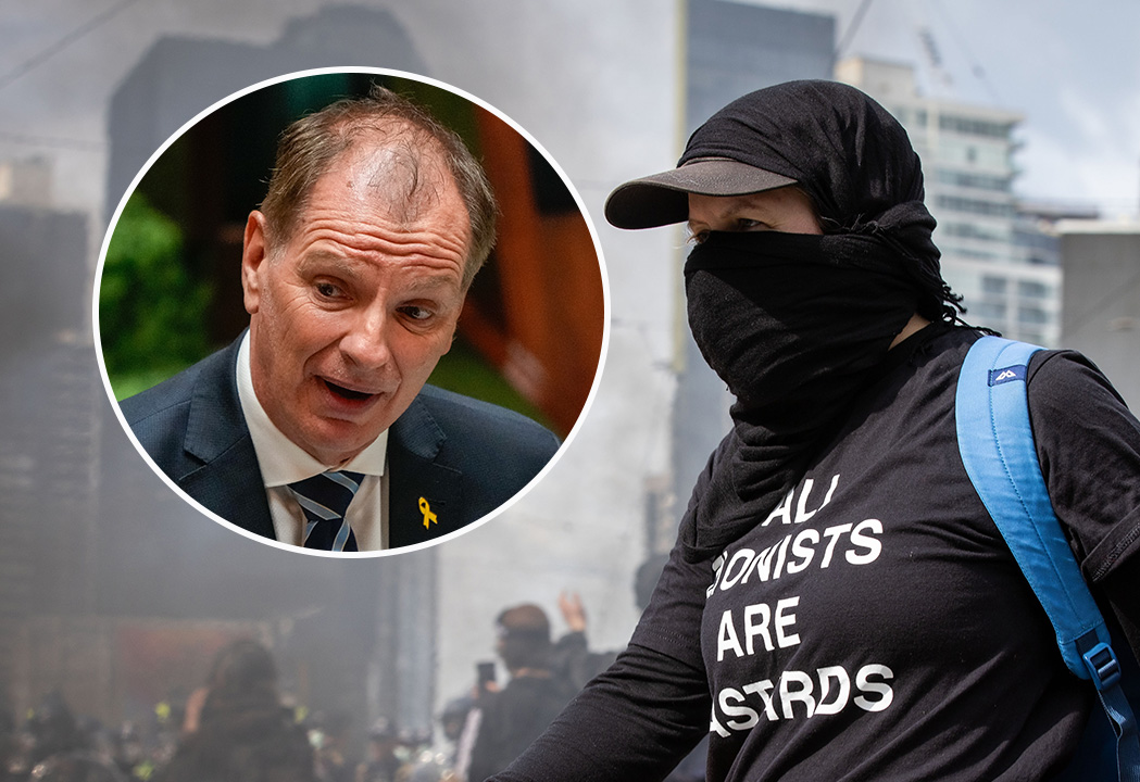 Article image for ‘Gutless cowards’: Liberal MP calls for mask ban at protests