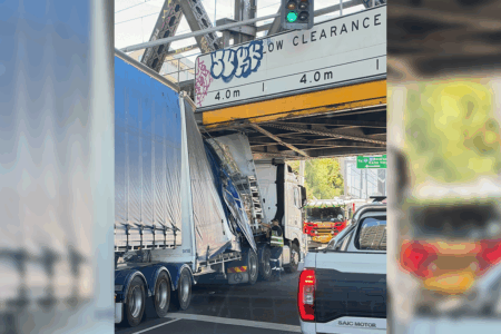 Truck hits bridge in Melbourne’s inner-north, train line suspended