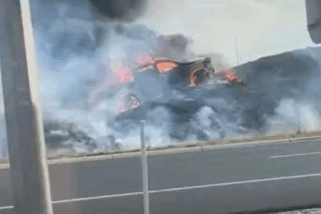 ‘It has kicked right off’: Big flames erupt on the side of the Monash Freeway