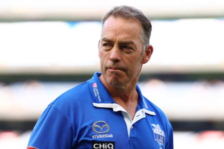 Sacked North Melbourne coach spotted dumping team gear at op shop